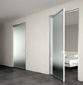 Porte-vetro-alluminio-battenti-Dinamika-con-stipiti-D-esterno-muro-2-1500